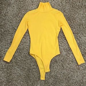Yellow turtle neck bodysuit small